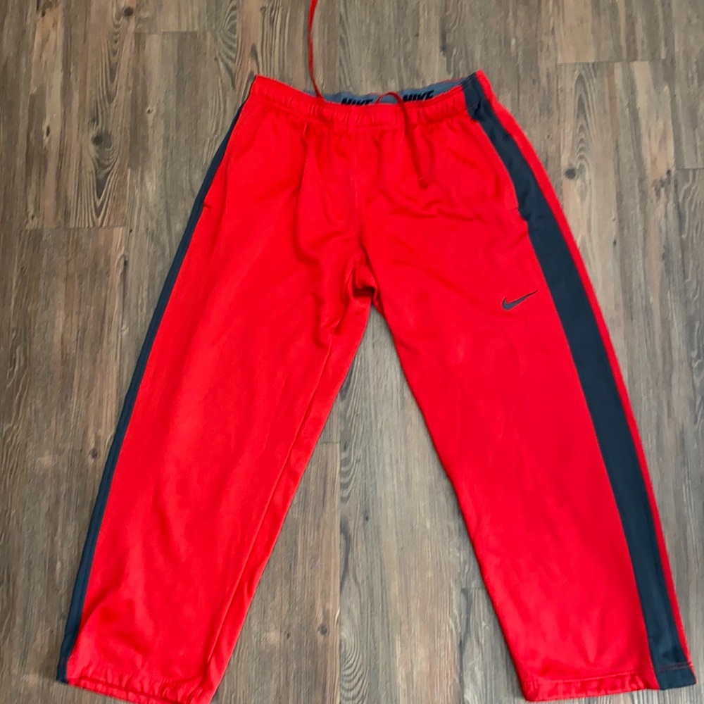 Red and grey sweat pants